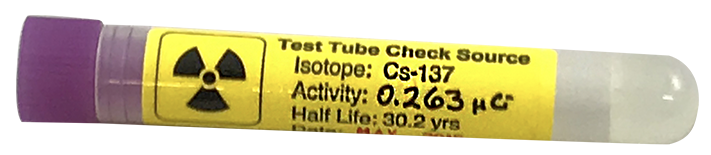 Radioactive check source for well detectors, beta and gamma radiation